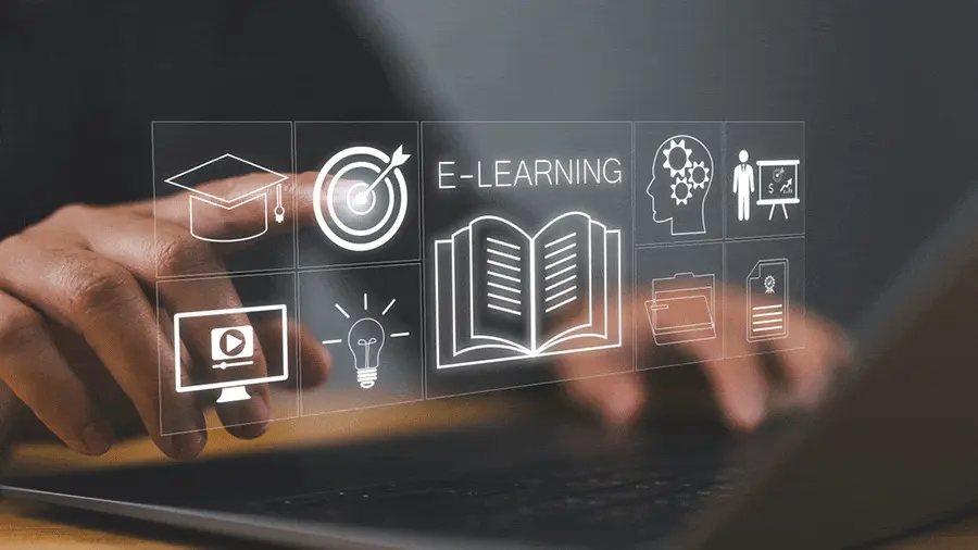 يد تعمل على لابتوب مع أيقونات تمثل مفاهيم التعليم الإلكتروني والتعليم التكيفي والمحتوى الرقمي